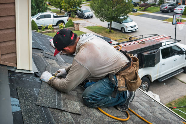 Professional Emergency Roof Repair technician working in Greens Fork, IN